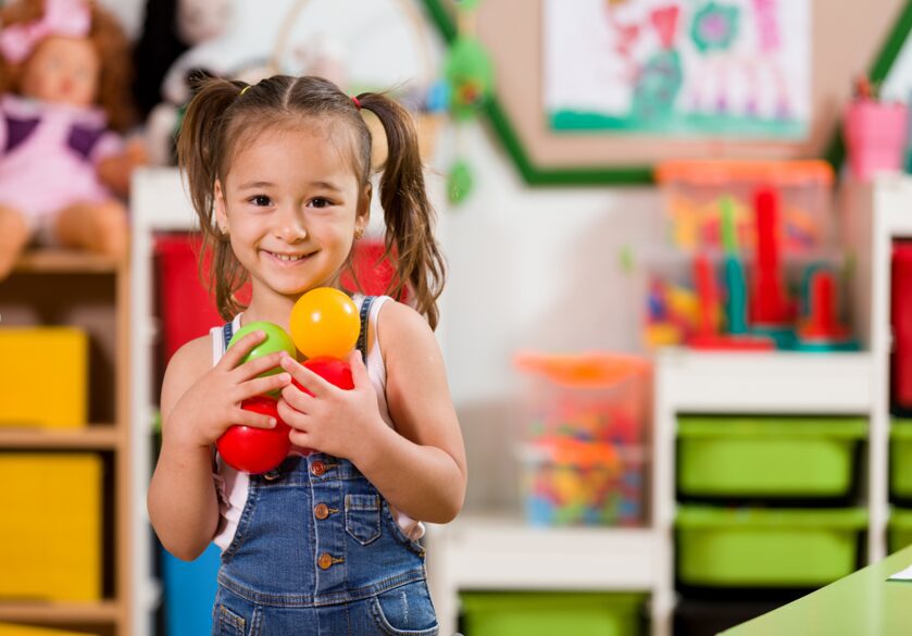 A Girl Holding Balls | CovenantSchool