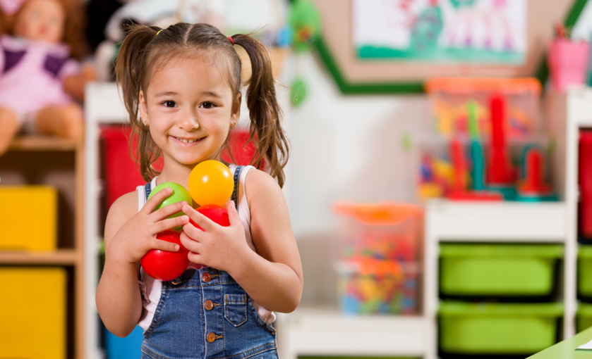 A Girl Holding Balls | CovenantSchool